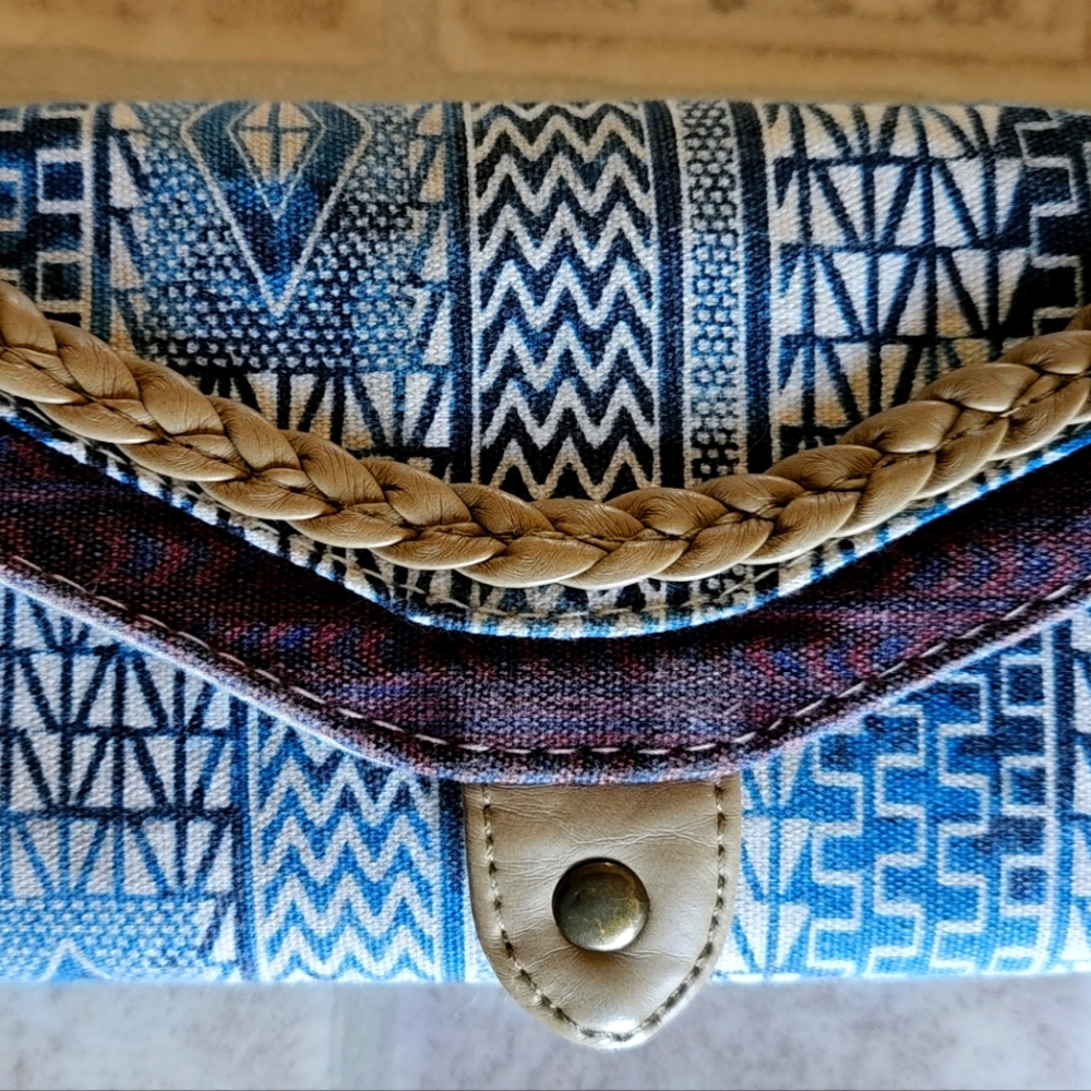 Multicolored fabric snap wallet in great condition.